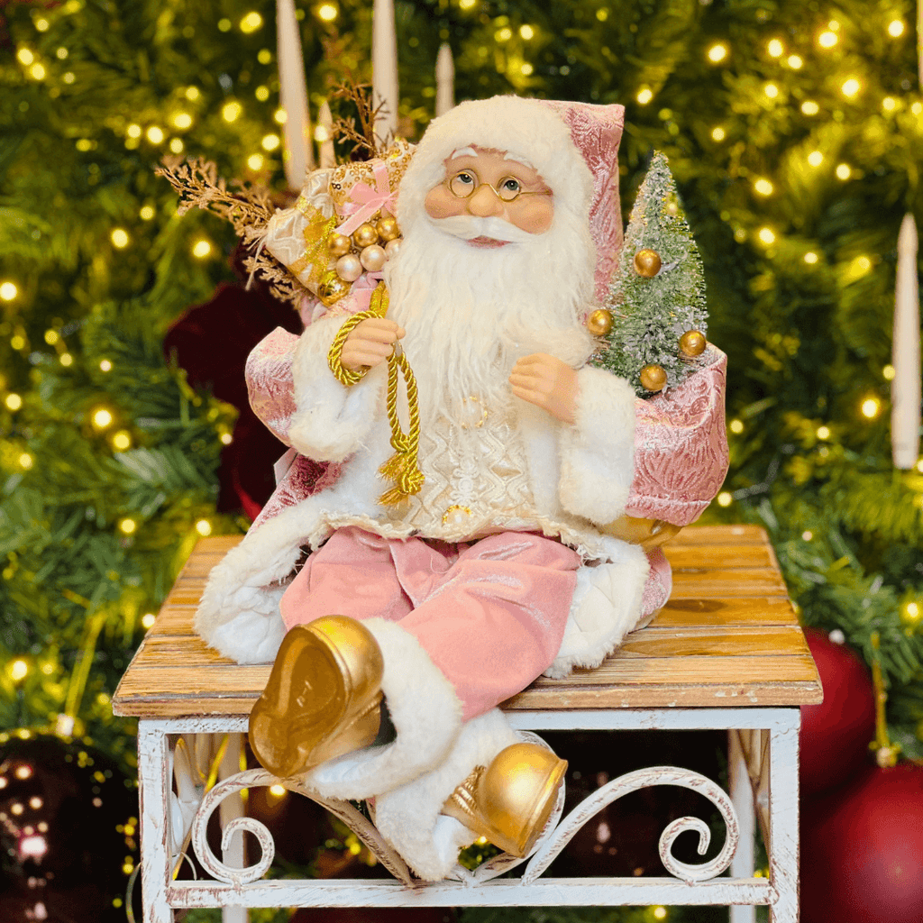 Papai Noel Sentado Com Presentes Rosa 28cm